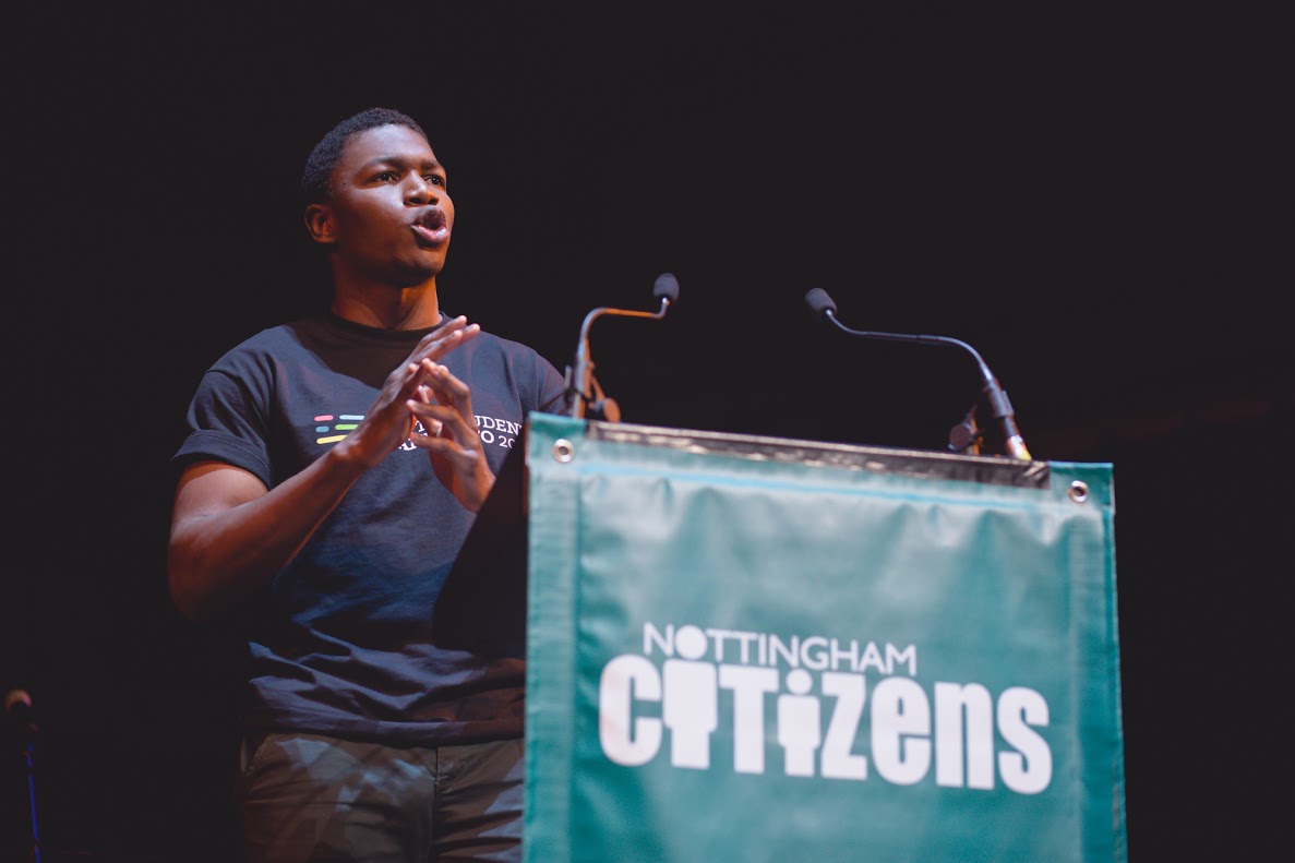 A photo of the website owner speaking at a political assembly